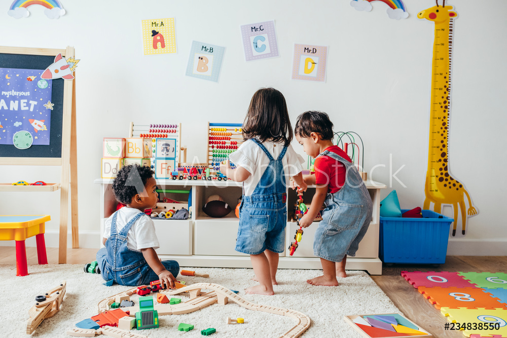 Young children enjoying in the playroom